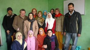 Richard and Barbara, second from left, and second from right, with the team